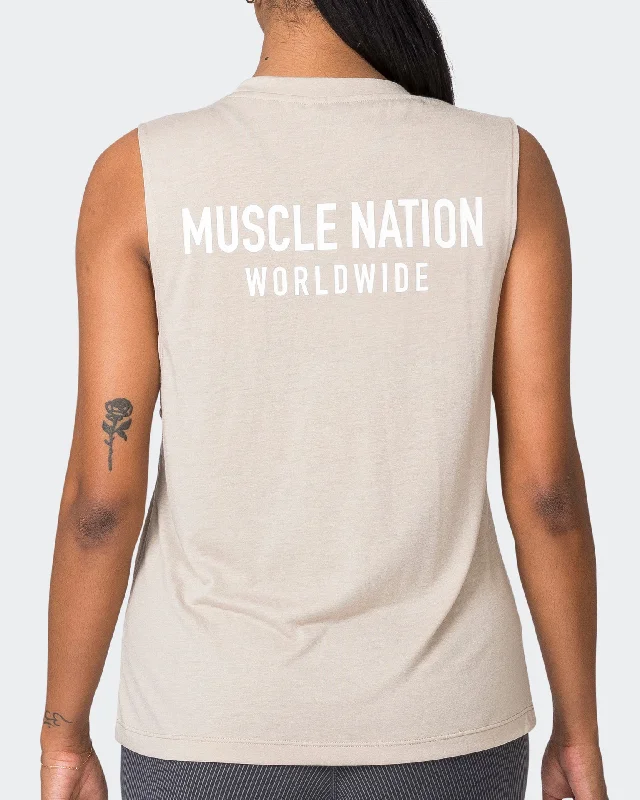 Women's Office Outfit Worldwide Drop Arm Tank - Bone